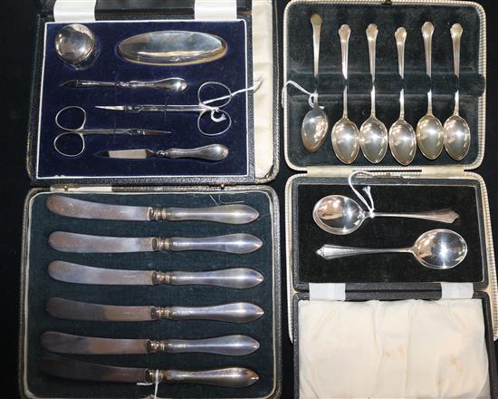 A six-piece silver-mounted manicure set, cased and three cased sets of flatware,